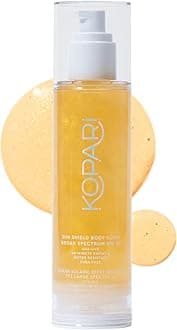 Kopari Sun Shield Body Glow | SPF 50 UV Protection Sheer Sunscreen Gold Shimmer Mica | Sweat and Water Resistant | Antioxidant Vitamin E Vegan Cruelty Free | Macadamia Hibiscus Avocado Coconut Oils