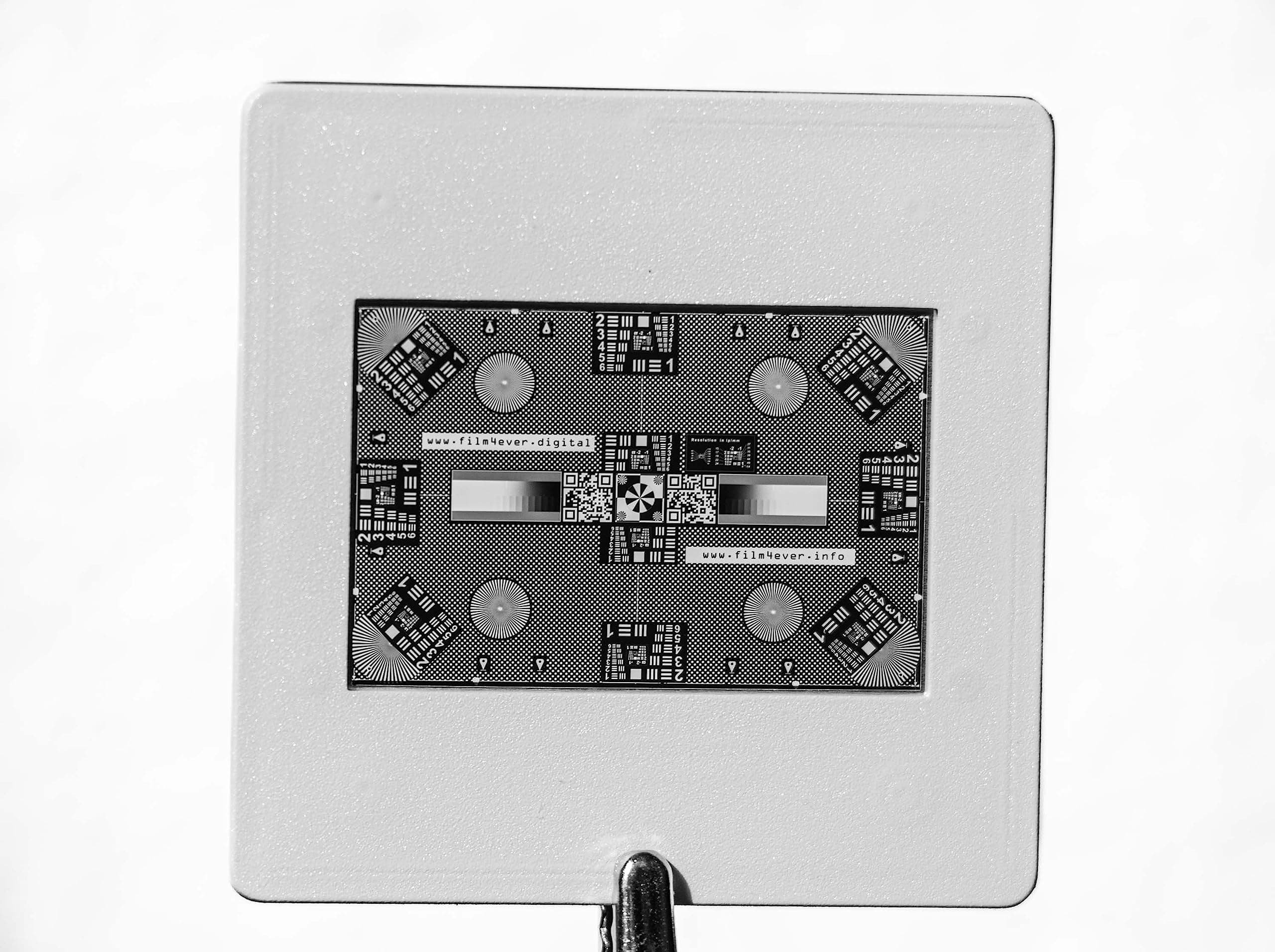 High-Res 35 mm Test Slide by Vlads Test Target for Camera Scanning. Digitize Slides with Highest Fidelity. Explore The Full Potential of Your Lens—Sharpness, Resolution, and Camera Performance.